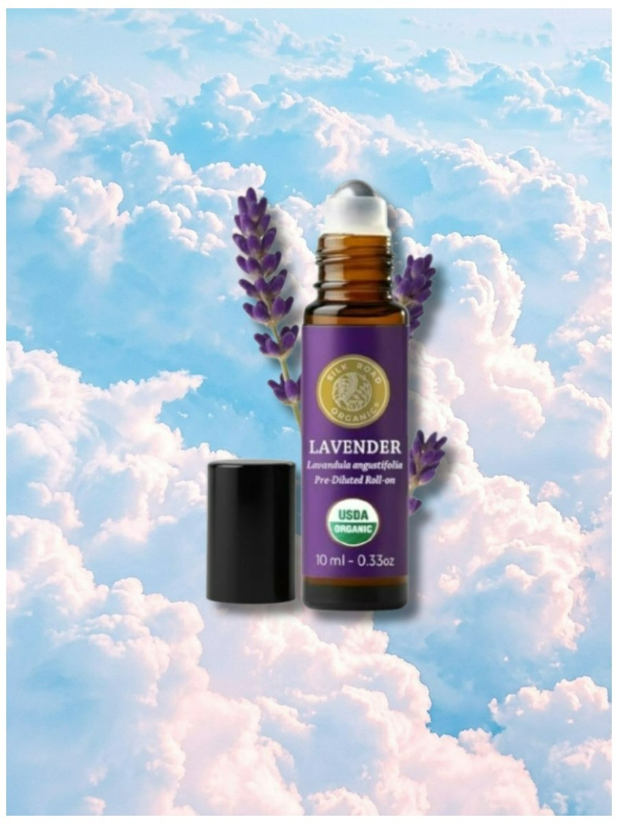 Silk Road Organic, Lavender Essential Oil Roll-on&amp;nbsp;on a dreamy pastel cloud background.