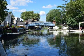 Little Venice in London, a canal with a bridge in the distance, by Matthew Waring