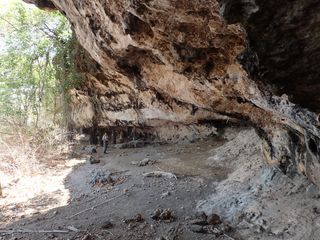 The limestone overhang on Kisar known as Jawalang 6 is one of more than 30 prehistoric rock art sites found by the researchers.