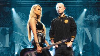 Sophie Lloyd and Matt Heafy of Trvium standing next to each other