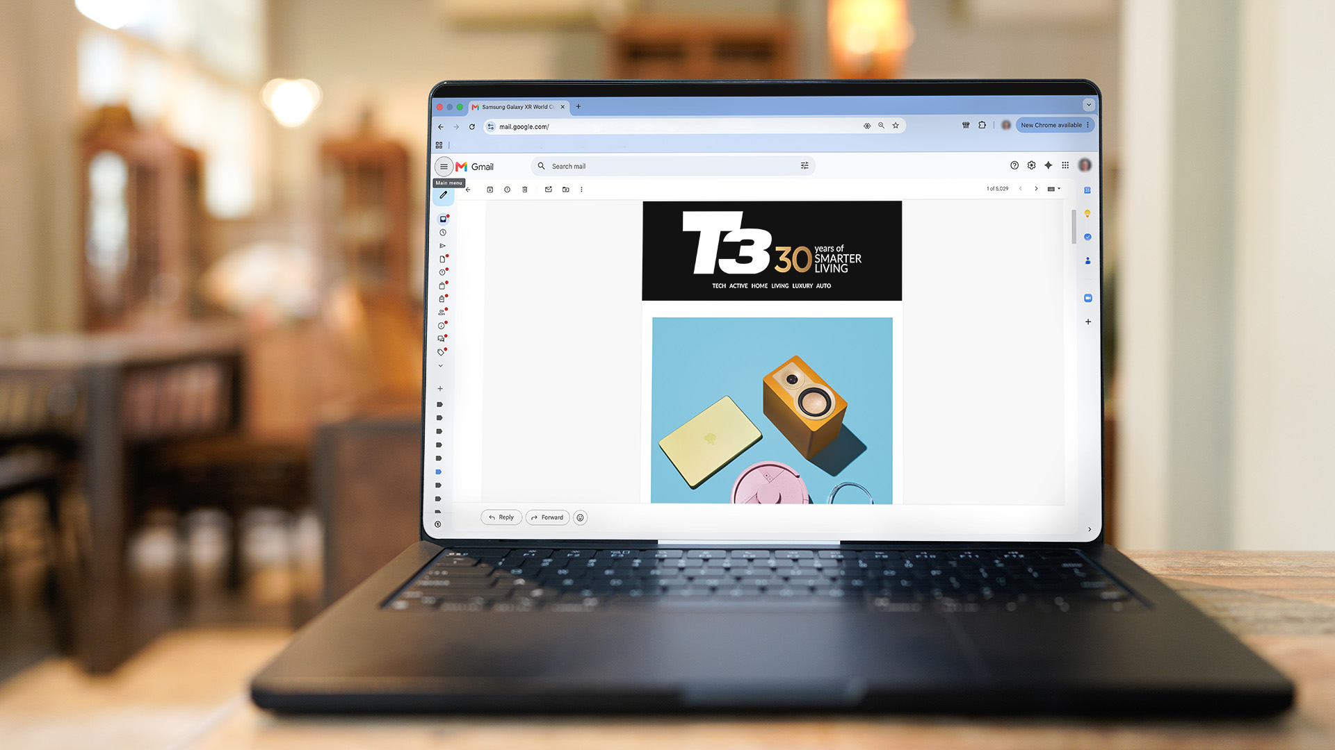 MacBook on table with T3 Newsletter on screen