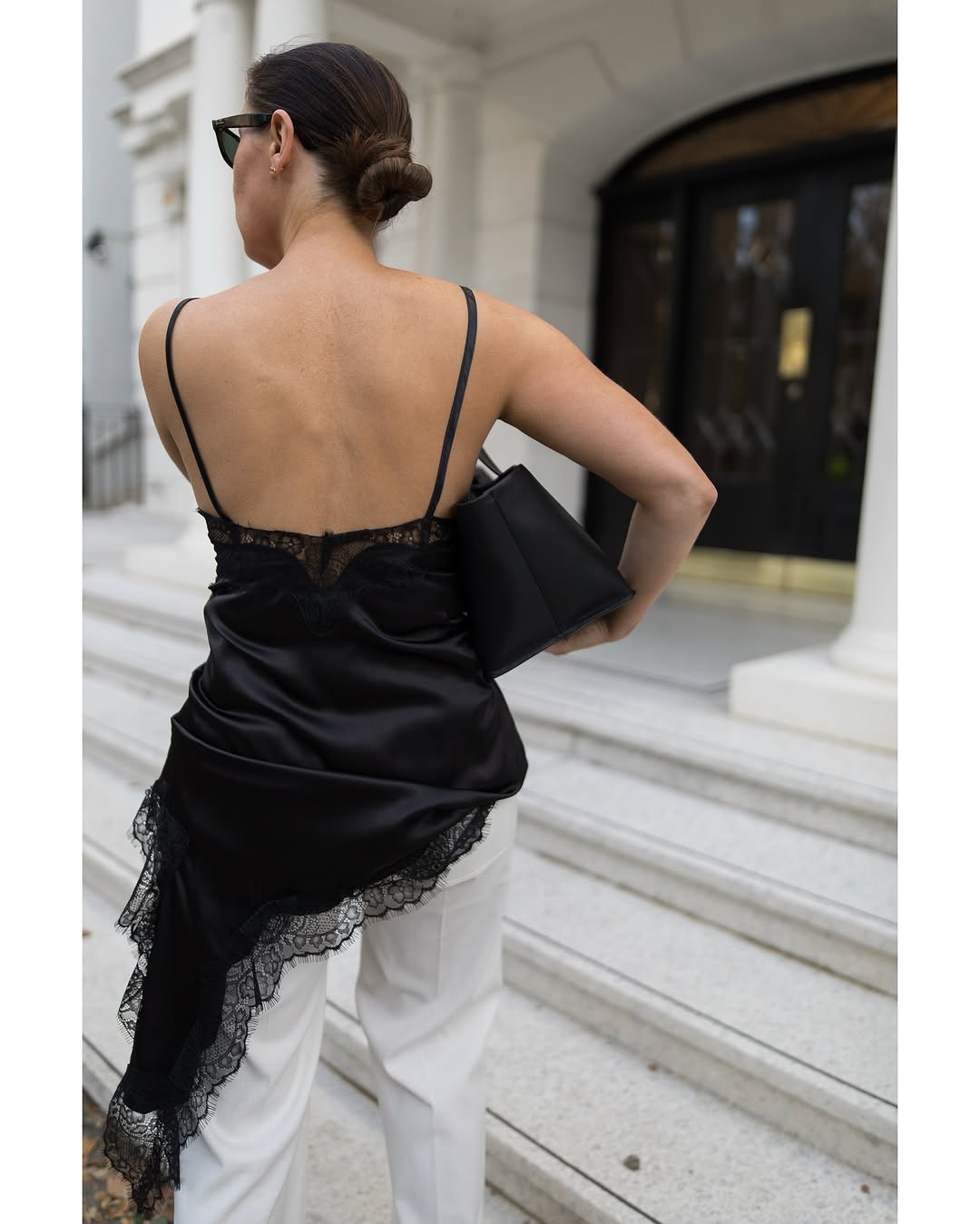 woman wearing black lace going out top outfit fall 2025