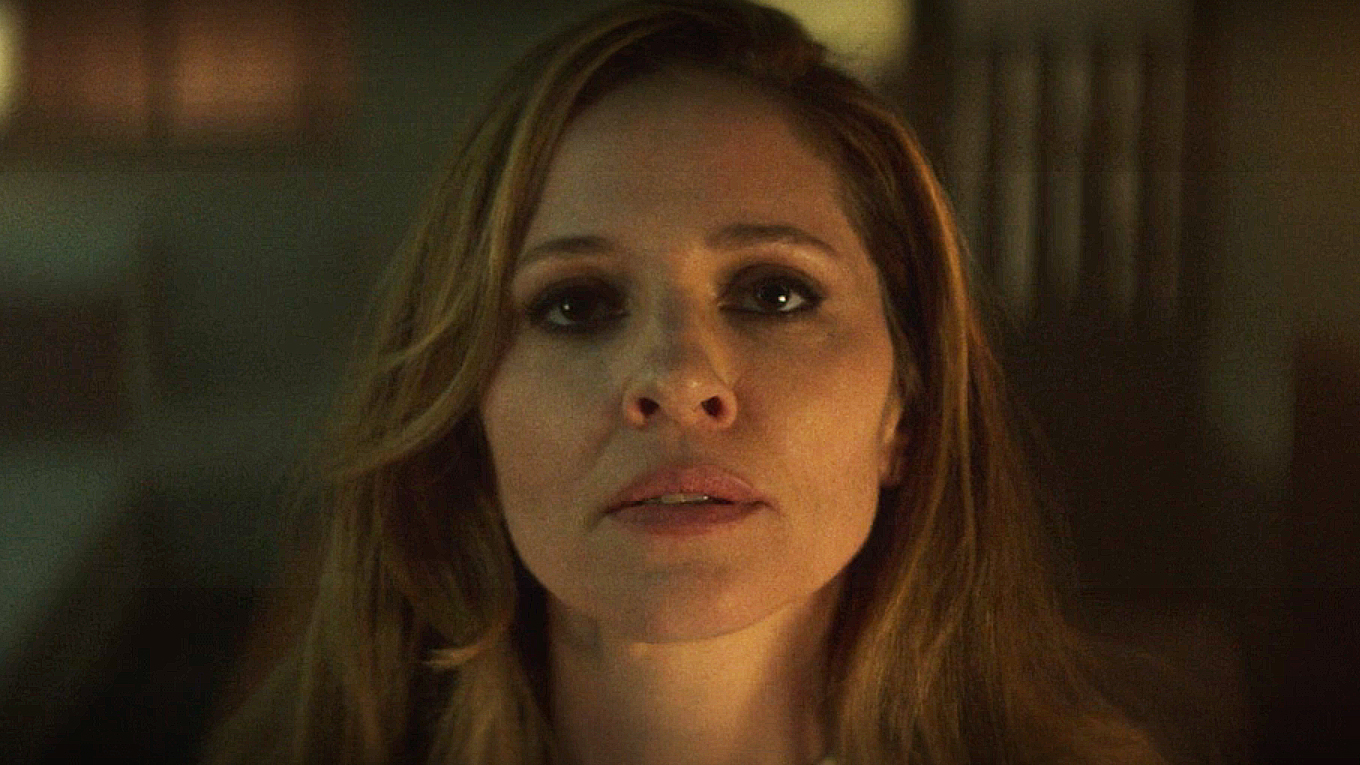 Heather Glenn looking up at a wall off-camera in Daredevil: Born Again season 2