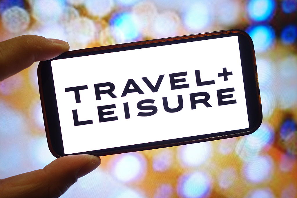 Travel + Leisure company logo idisplayed on a smartphone screen.