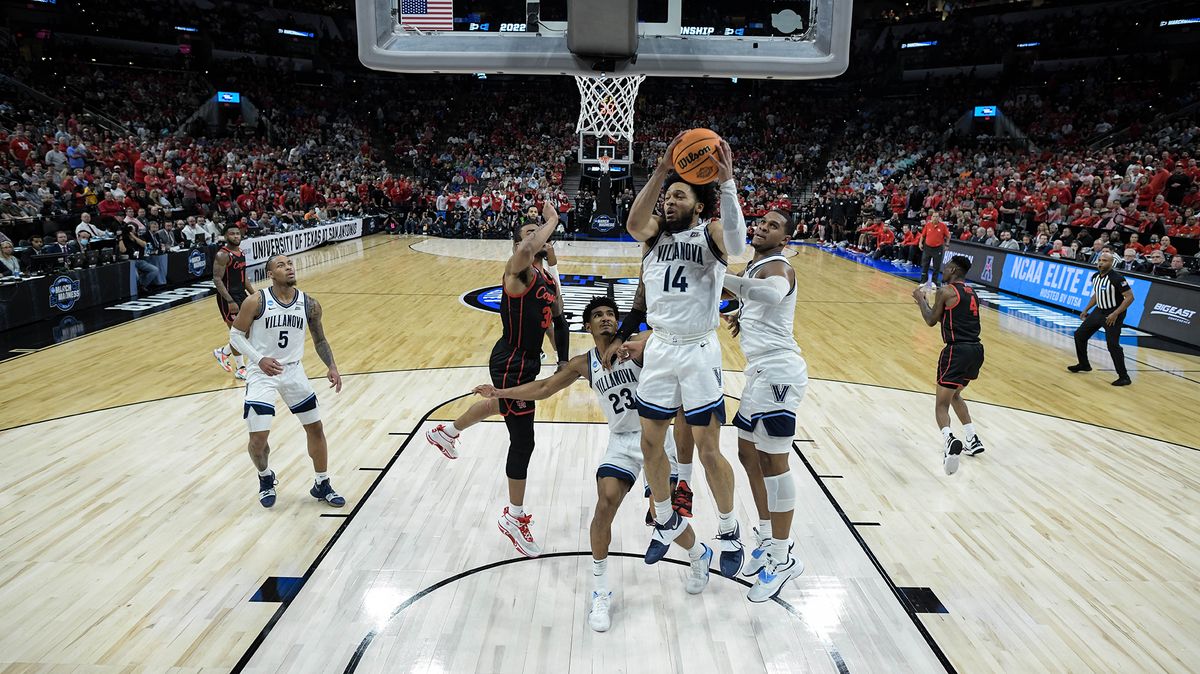 Caleb Daniels #14 of the Villanova Wildcats makes a defensive rebound against the Houston Wildcats during the Elite Eight round of the 2022 NCAA Mens Basketball Tournament held at AT&amp;T Center on March 26, 2022 in San Antonio, Texas.