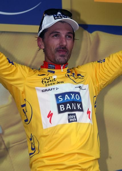 Fabian Cancellara dons the Tour's first maillot jaune.
