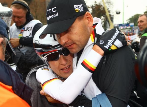 Judith Arndt (Germany) gets a hug after her gold medal winning ride.