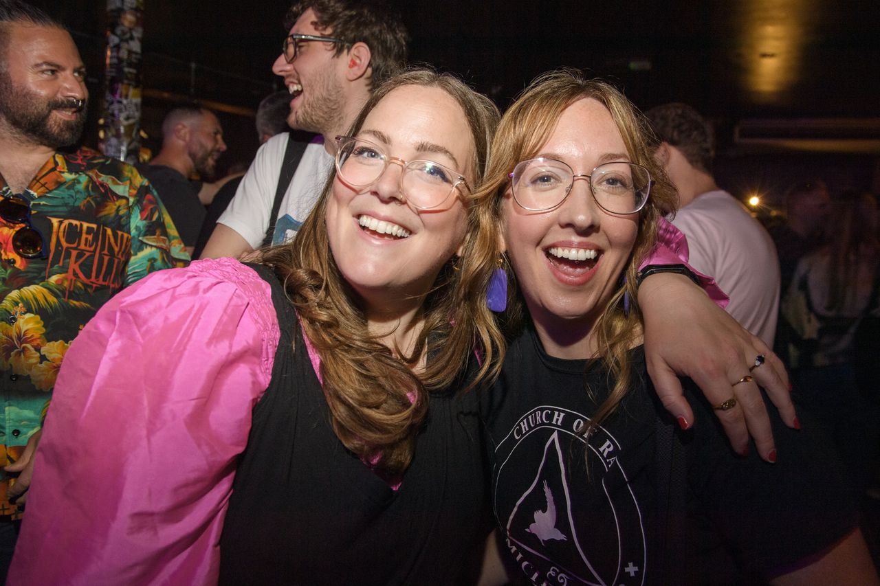 Two women smiling at the Metal Hammer 400 party