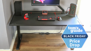 Secretlab Magnus Pro standing desk with a deal badge