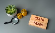 Wooden blocks with death and taxes inscribed on them. Death is certain and so are taxes on the money or property you leave behind. 