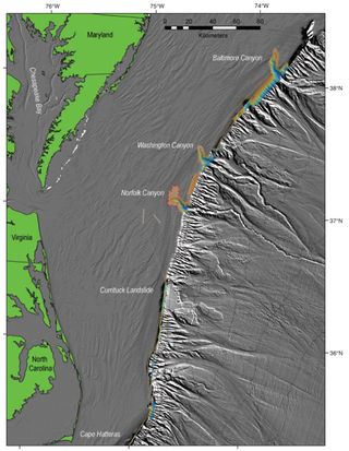Multibeam bathymetric data collected during the June 2011 Nancy Foster cruise (except for area around upper Norfolk Canyon, surrounded by dashed red line, where data are courtesy of Rod Mather, University of Rhode Island). The gray shaded-relief data were compiled from existing bathymetric datasets produced by the USGS Woods Hole Coastal and Marine Science Center.
