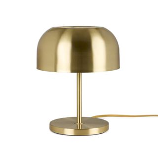 A gold mushroom lamp