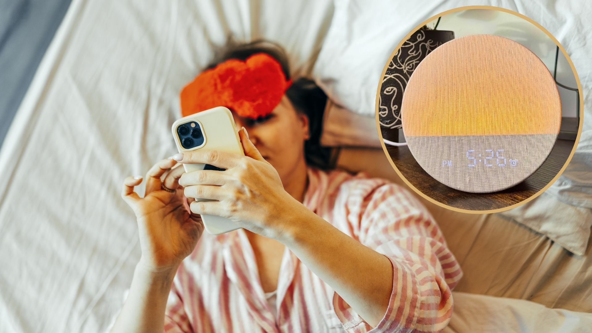 The image shows a dark-haired woman lying in bed with an eye mask pulled up over one eye, holding a phone in front of her face. An image of a round and glowing sunrise alarm clock is inset in the top right hand corner.