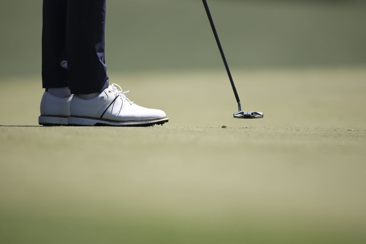 A detailed view of the shoes worn by Cameron Young of the United States during the second round of the 2026 Masters Tournament at Augusta National Golf Club