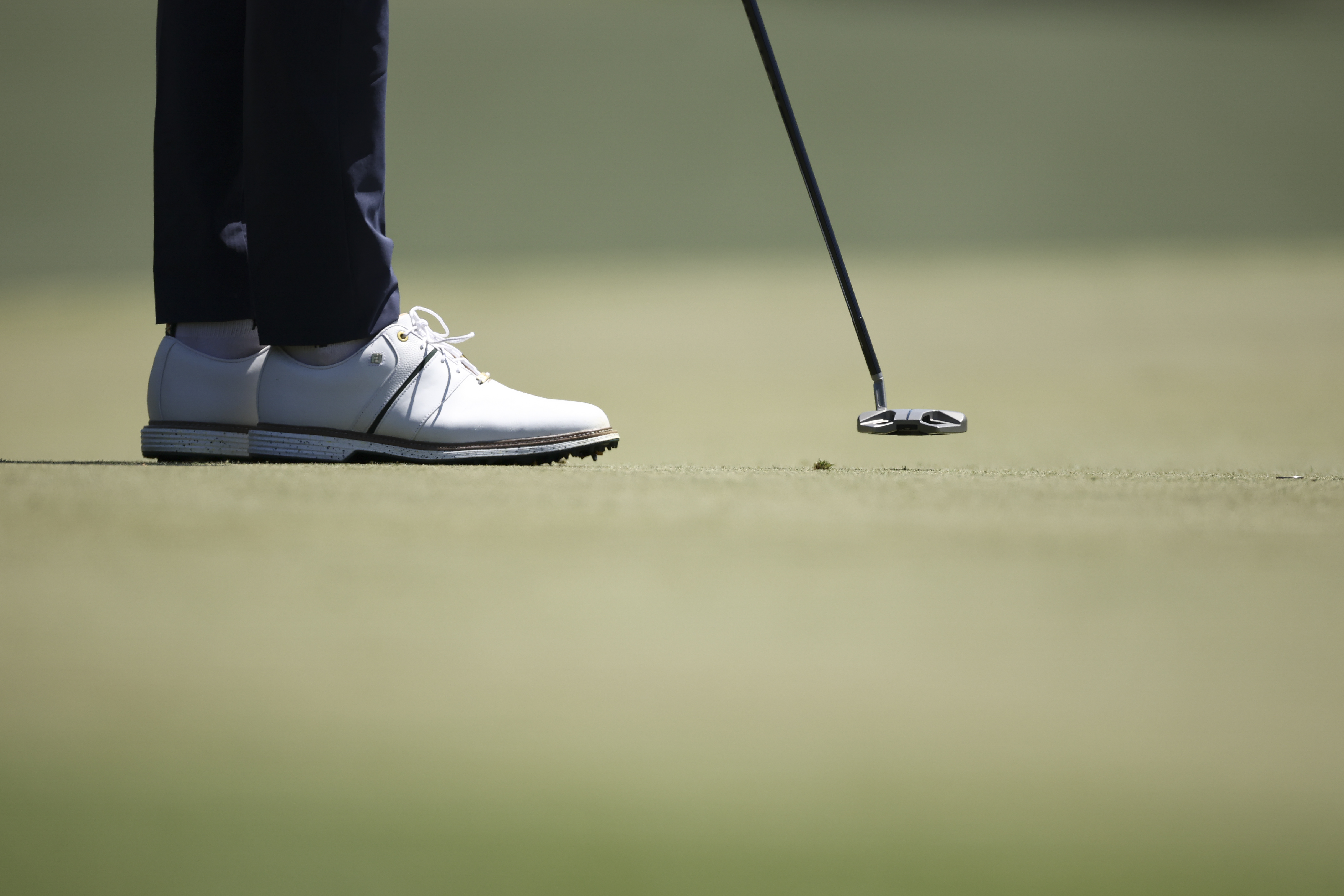 A detailed view of the shoes worn by Cameron Young of the United States during the second round of the 2026 Masters Tournament at Augusta National Golf Club 