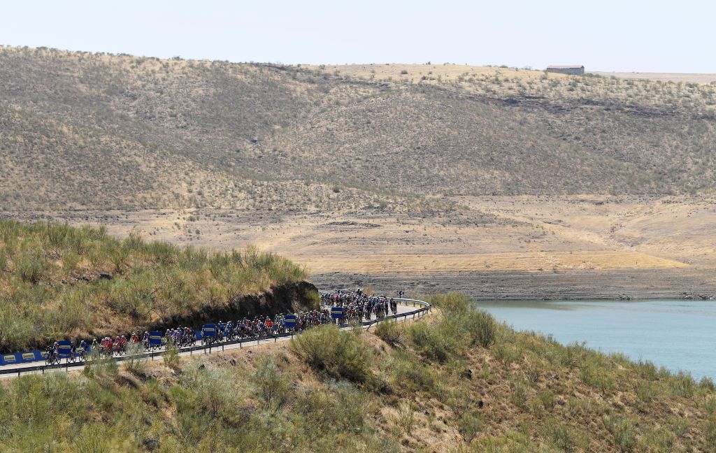 VILLANUEVA DE LA SERENA SPAIN AUGUST 27 A general view of the peloton compete during the 76th Tour of Spain 2021 Stage 13 a 2037km stage from Belmez to Villanueva de la Serena lavuelta LaVuelta21 on August 27 2021 in Villanueva de la Serena Spain Photo by Tim de WaeleGetty Images