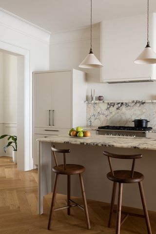 A small kitchen with wooden flooring