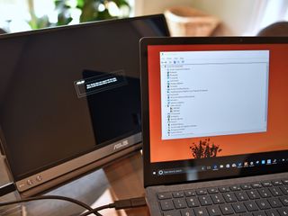 The Asus ZenScreen not running with Windows 10 S due to missing USB drivers.