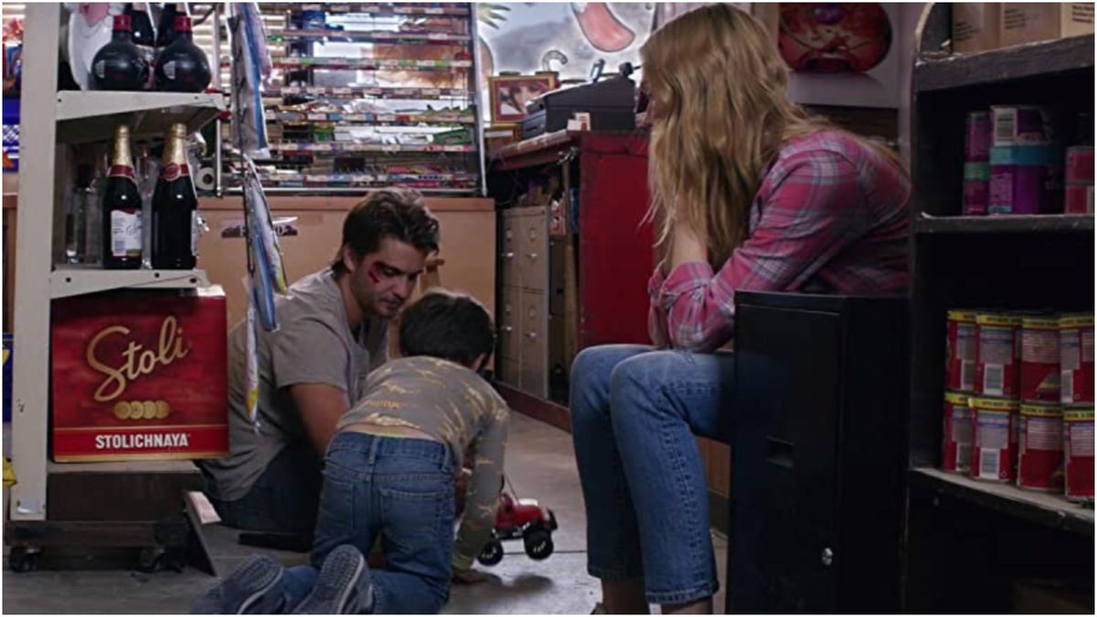 Luke Grimes as Eric Norris in the Netflix Christmas movie, El Camino Christmas.