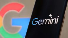 Google Gemini logo on phone with Google logo in background