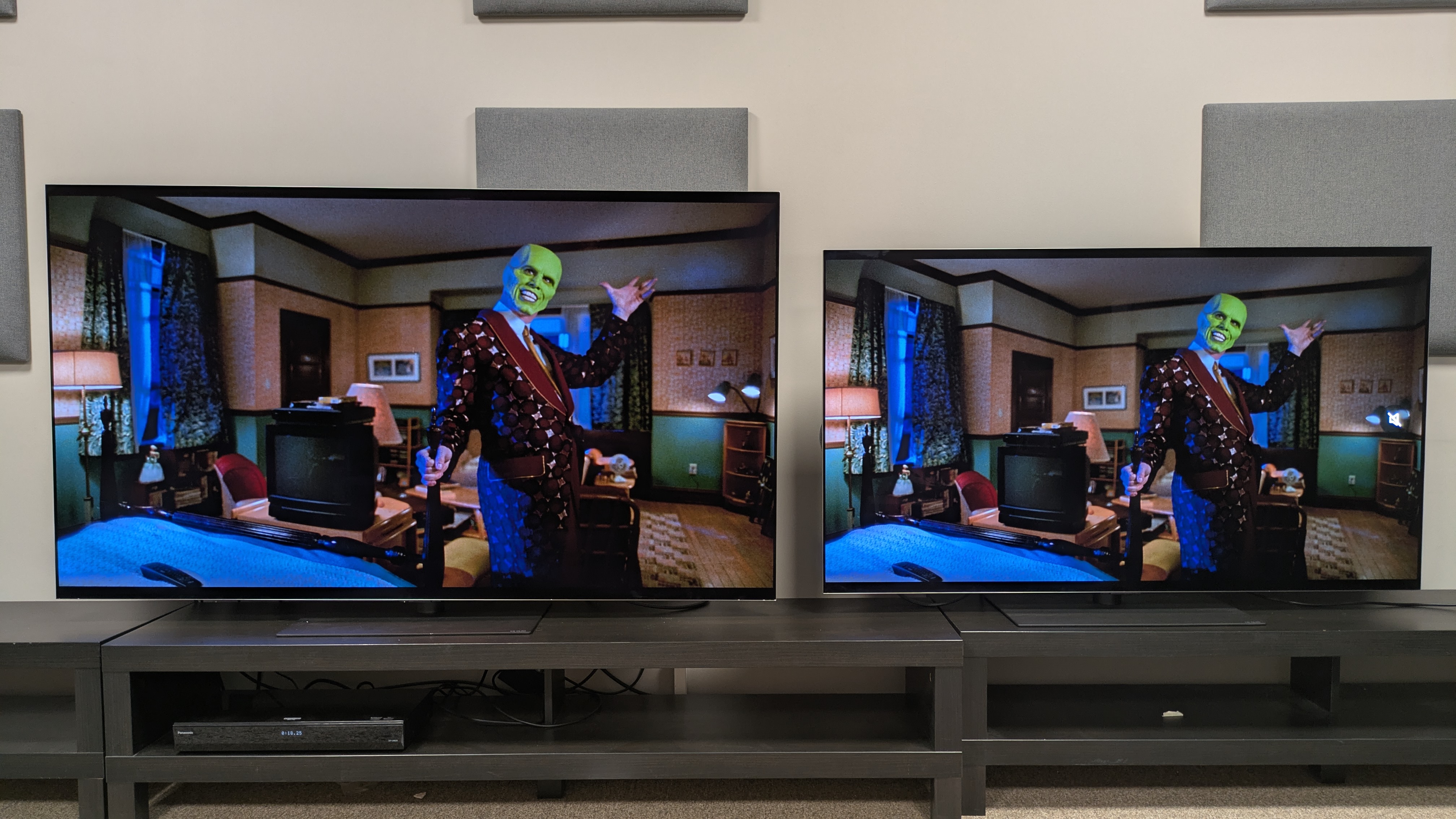 The LG G6 (left) and LG G5 (right) showing The Mask on screen, used as a test for both TVs built-in sound, with the G6's sounding more balanced
