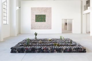 Jannis Kounellis, Untitled, 2005, Lead, clothes, earth, cacti. Private Collection Rome, Italy;  Elias Sime, TIGHTROPE: ECHO, 2020
