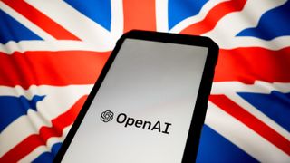 A phone displaying the OpenAI logo in front of the union jack flag.