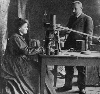 Marie Curie (1867 – 1934), one of just two female scientists to ever win a Nobel in physics, shown here in her lab with her husband and French chemist Pierre (1859 – 1906).