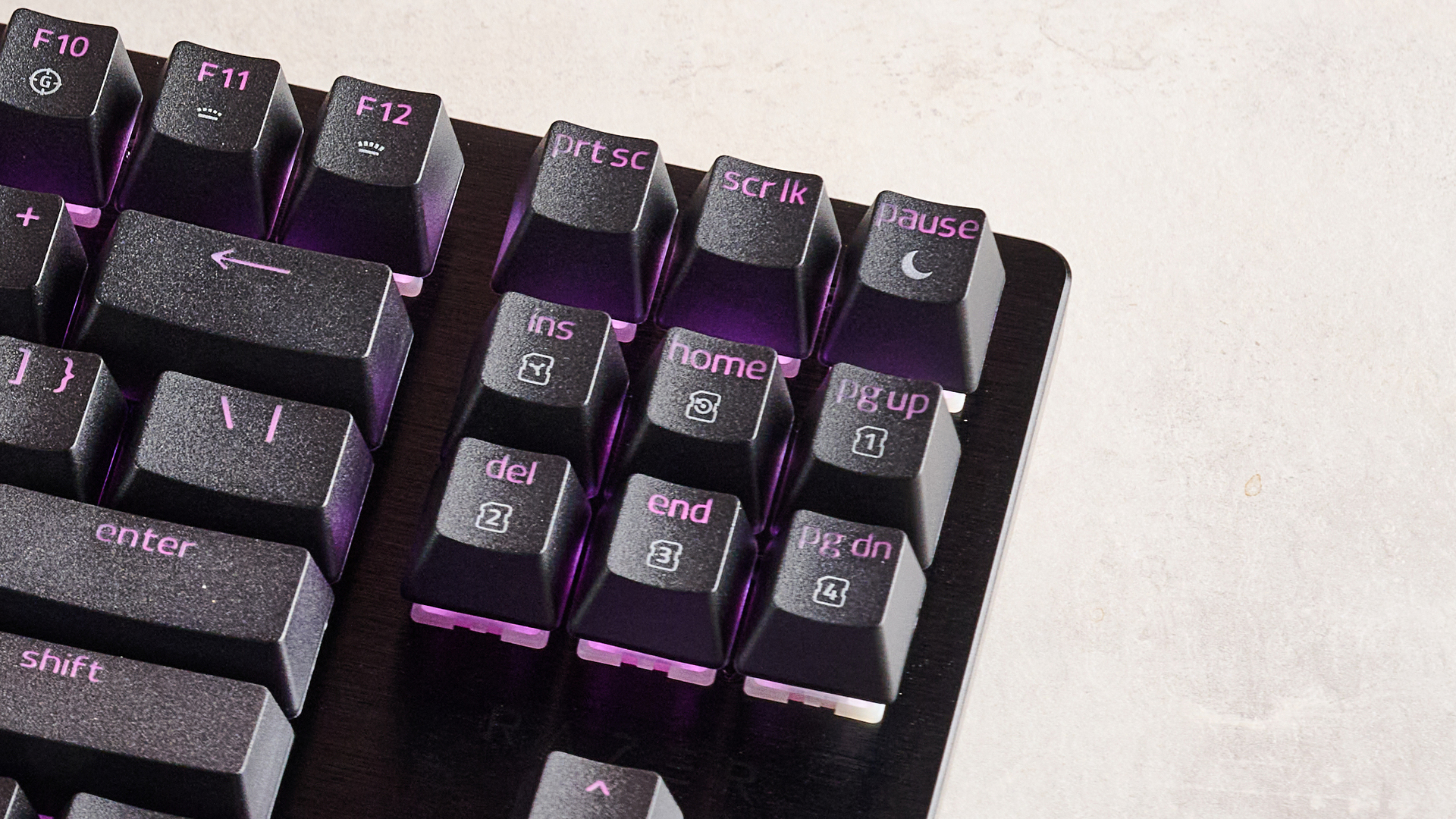 Close-up of navigation keys on Razer Huntsman V3 HE Magnetic Tenkeyless 8KHz on desk