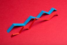 Red and blue graphs on red background. Finance stock market, strategy or analysing concept.