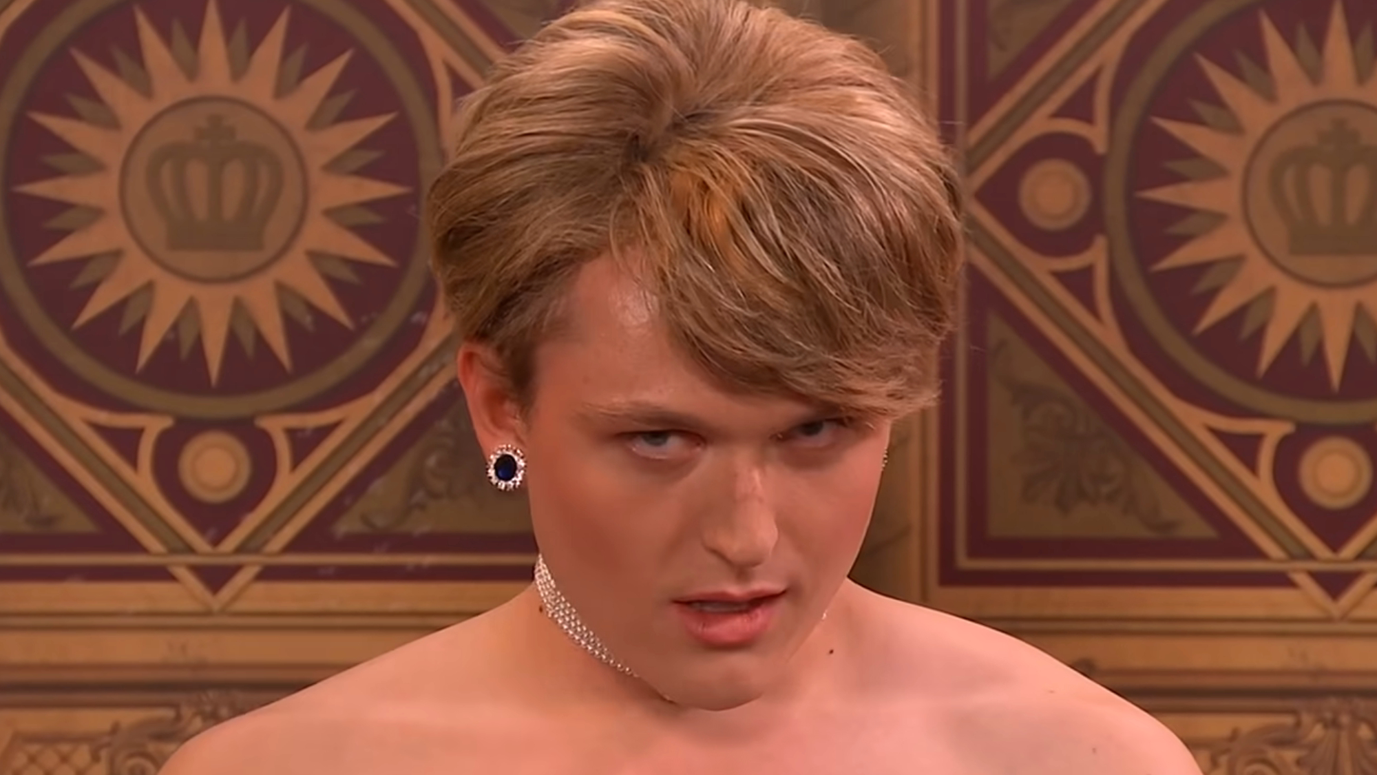 Jack Shep shyly looks up as Princess Diana during an SNL UK sketch.