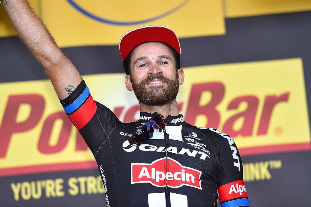 Simon Geschke on the stage 17 podium.