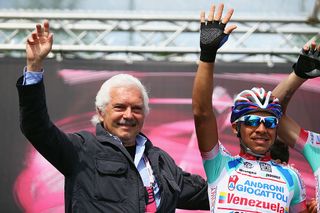 Gianni Savio waves on stage at the 2014 Giro d'Italia