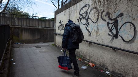 A man walking in an underpass in Leeds