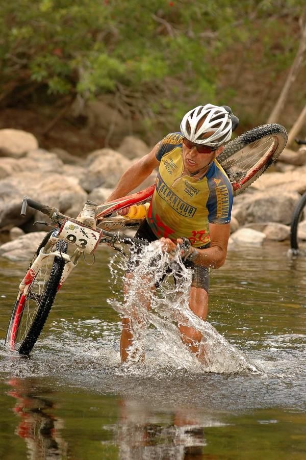 Czech Milan Spolc splashes himself with water