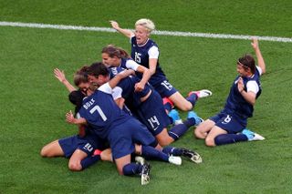 USA players celebrate a goal in the women's football final at the 2012 Olympics in London.