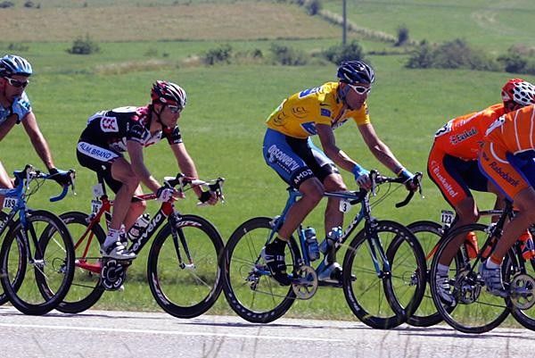 George Hincapie (Discovery) site comfortably in the pack.