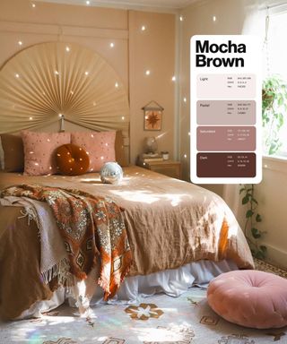A light-dappled, warm brown bedroom filled with retro decor, including a disco ball, floral groovy throw blanket, and houseplants