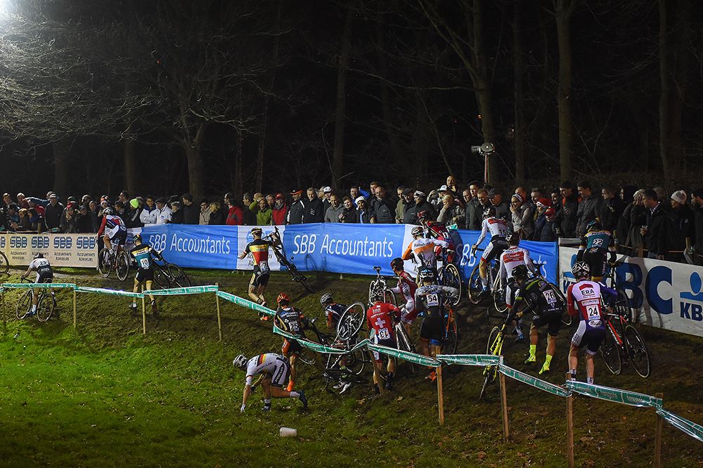 Riders try and avoid the crash site