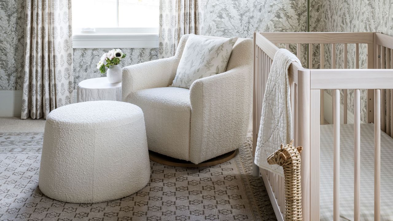 Studio McGee nursery with boucle armchair and crib