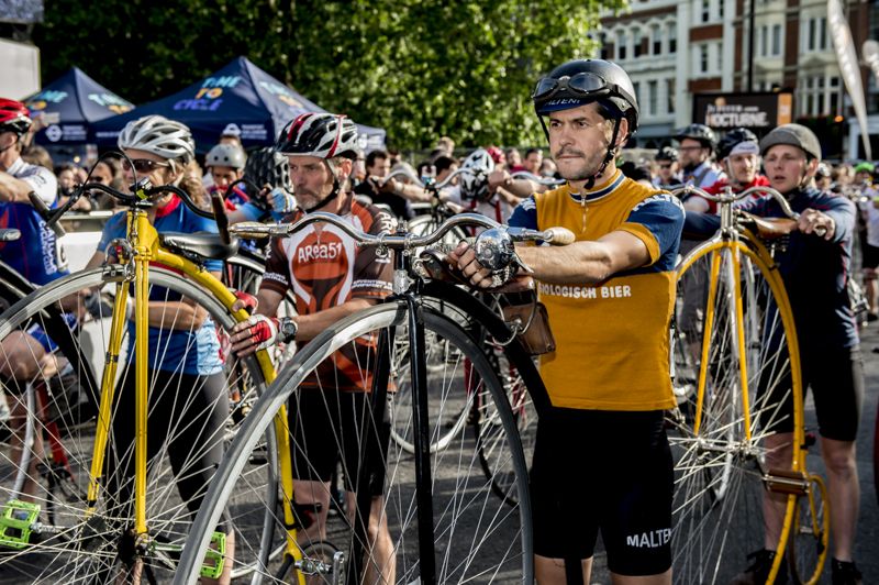 The penny farthing competitors wait for the start