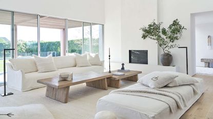 A modern, all-white living room with seaside feel