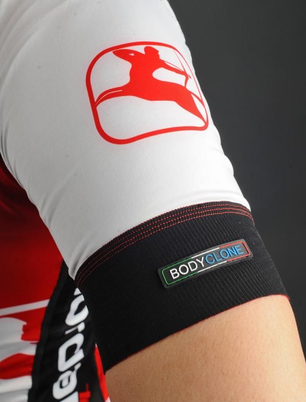 Antigua fabric bands around the arm openings, hem and leg openings provide a close but unrestrictive fit.