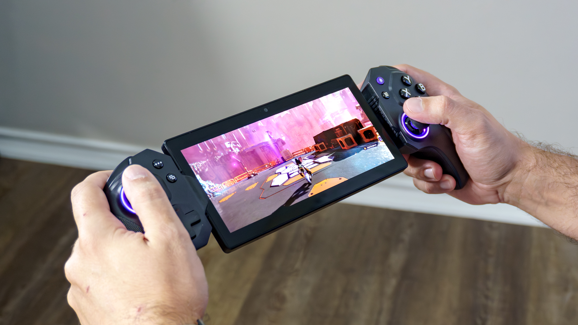A person playing Ratchet &amp;amp; Clank: Rift Apart remotely on the Elo Vagabond mobile game controller