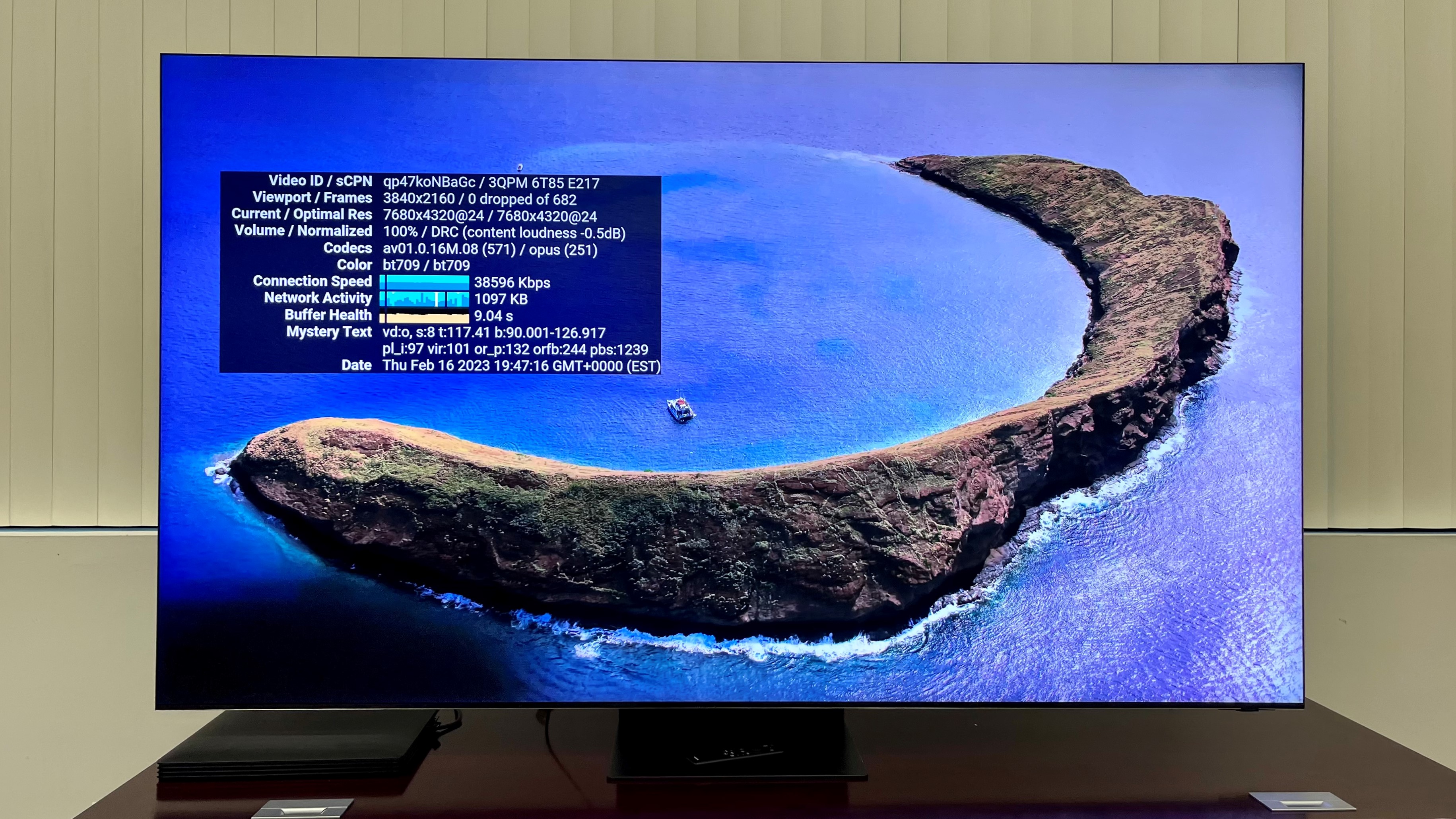 Samsung-QN900C showing island surrounded by blue water
