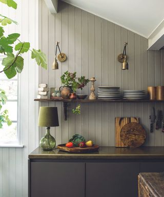 Black cabinets, grey and white wooden walls