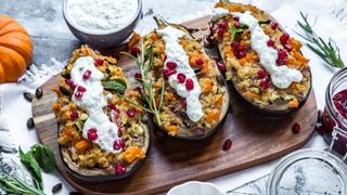 Filled aubergine, bulgur, pumpkin, pomegranate, zucchini, rosmary, tzaziki, mint, vegetables