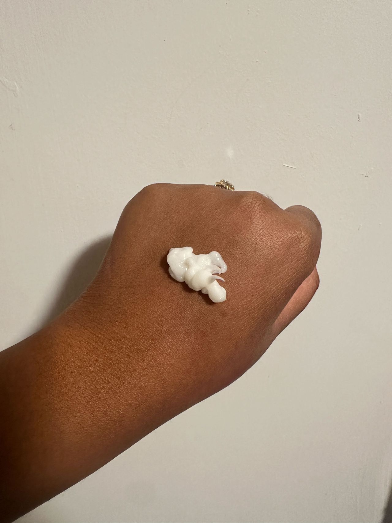 Ariel Baker testing Curlsmith Heat Protector Styling Serum