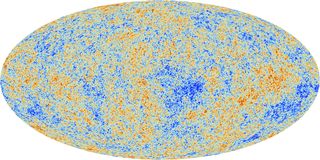 An image of the CMB from the Planck telescope. The image shows a large oval containing various blobs of blues, yellows, and reds.