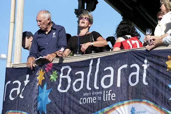 Phil Liggett was enjoying the racing and scenery from high on the balcony of one of the local hotels situated around the course.